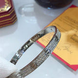 Close-up detail view of Cartier unisex jewelry piece