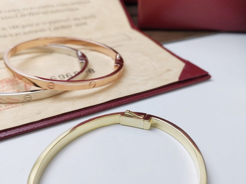 Side view of Cartier unisex jewelry piece