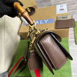 Styled lifestyle shot of polished everyday-luxe women's handbag – women's statement bag