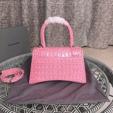 Styled lifestyle shot of statement polished women's handbag – women's statement bag