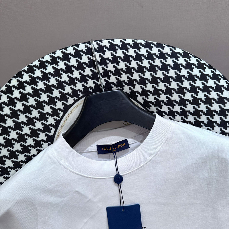 Full styled look of Louis Vuitton cotton t-shirt with monogram-inspired silhouette