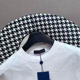 Full styled look of Louis Vuitton cotton t-shirt with monogram-inspired silhouette