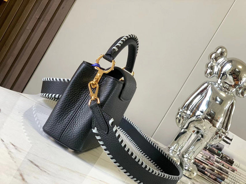 Close-up detail of polished structured women's handbag – women's luxury accessory