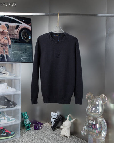 Front view of Louis Vuitton luxury clothing with signature branding