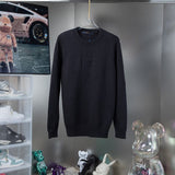 Front view of Louis Vuitton luxury clothing with signature branding