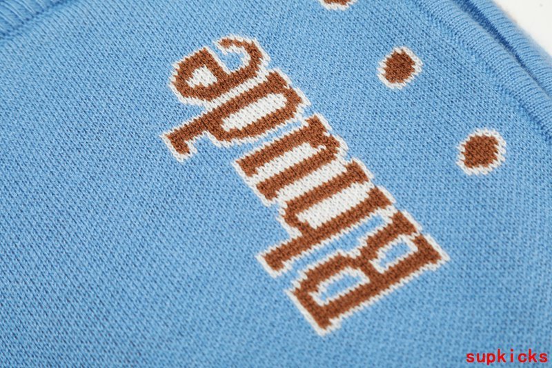 Full styled look of Rhude luxury clothing with label-forward styling