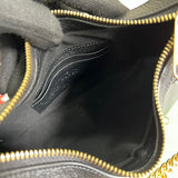 Side profile of polished elevated women's handbag – women's luxury accessory