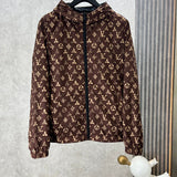 Full styled look of Louis Vuitton luxury clothing with label-forward styling