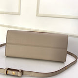 Styled lifestyle shot of statement everyday-luxe women's handbag – women's designer-style accessory