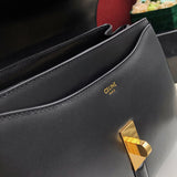 Front view of modern classic women's handbag – women's designer-style accessory