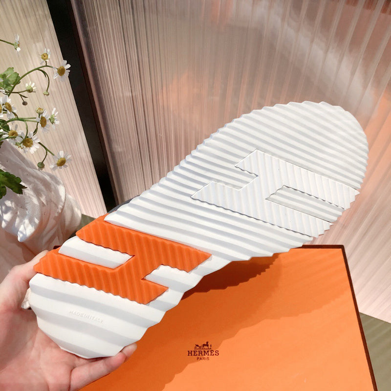 Hermès White High-Top Sneakers - Studio Shot