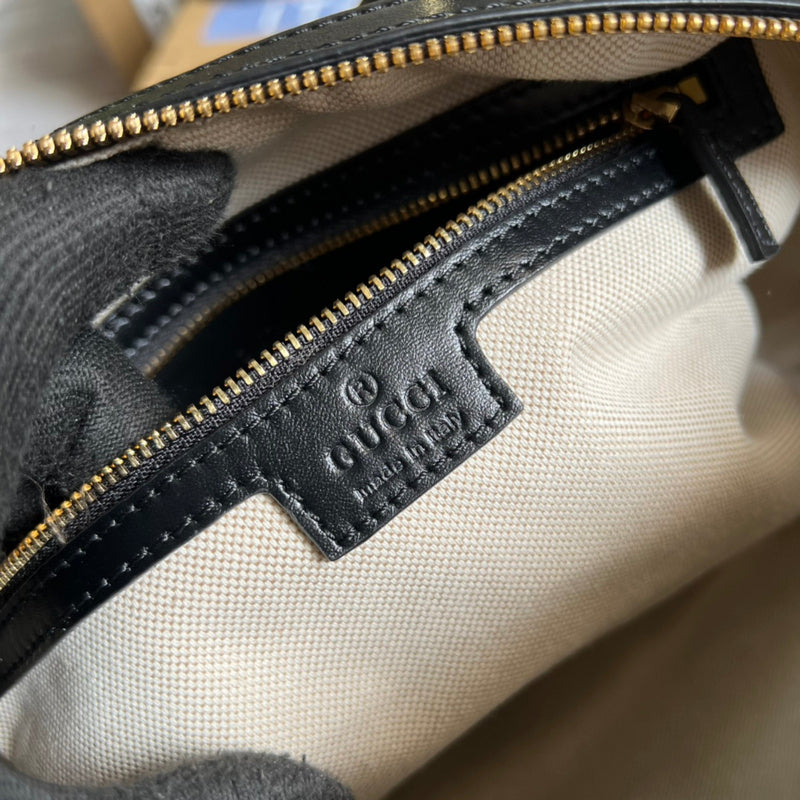 Side profile of refined statement women's handbag – women's premium purse