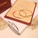Close-up detail view of Cartier unisex jewelry piece
