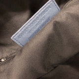 Side profile of classic refined women's handbag – women's luxury handbag