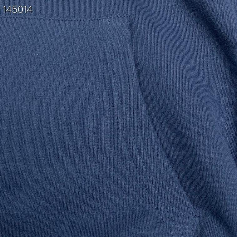 Close-up detail shot of Louis Vuitton luxury clothing with relaxed-fit cut