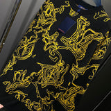 Side profile of Louis Vuitton luxury clothing with runway-inspired design