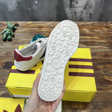 Side profile of Gucci muted earth tones sneakers cushioned comfort fit