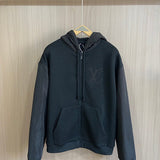 Front view of Louis Vuitton luxury clothing with everyday silhouette