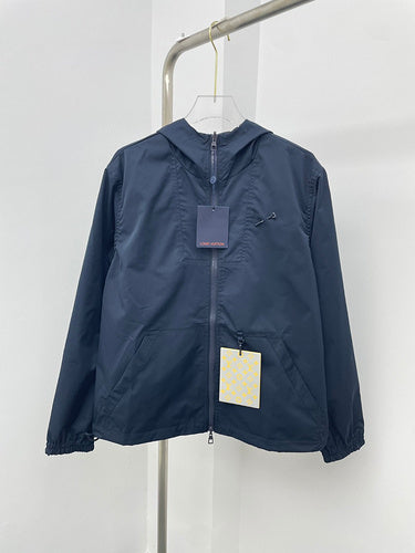 Full styled look of Louis Vuitton luxury clothing with tailored silhouette