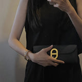 Side view of effortless structured handbag