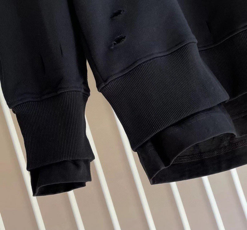 Texture and finish detail of Givenchy luxury piece style No.121