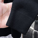 Close-up detail shot of Louis Vuitton luxury clothing with relaxed-fit cut
