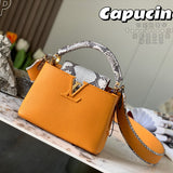 Front view of sleek polished women's handbag – women's luxury accessory