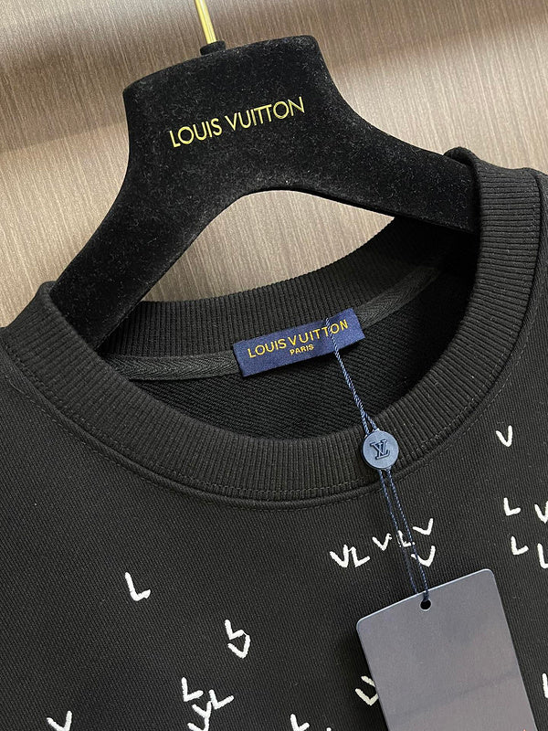 Front view of Louis Vuitton luxury clothing with tailored silhouette
