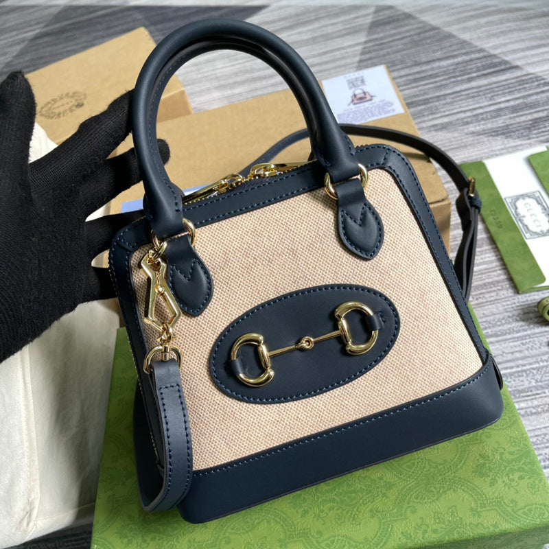 Front view of polished structured women's handbag – women's designer-style accessory