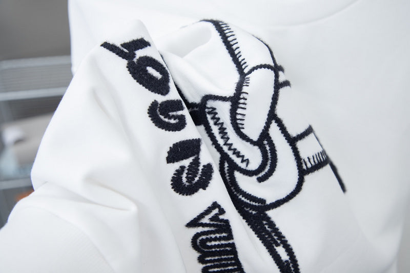 Front view of Louis Vuitton luxury clothing with logo-detail design