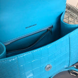 Side profile of modern structured women's handbag – women's luxury handbag