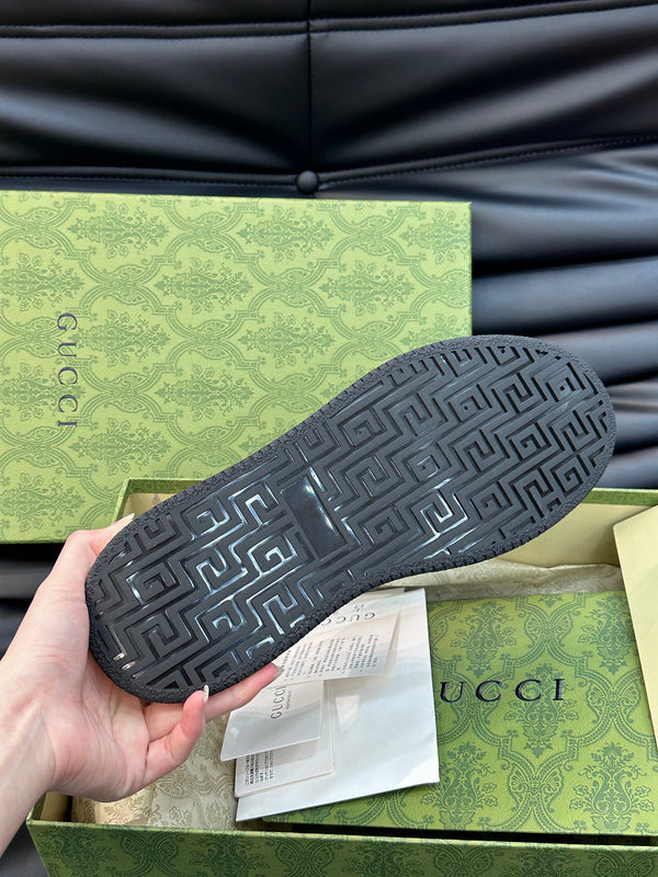 Gucci sneakers detailed view showing premium designer craftsmanship