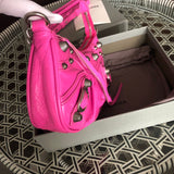 Close-up detail of modern polished women's handbag – women's designer-style accessory