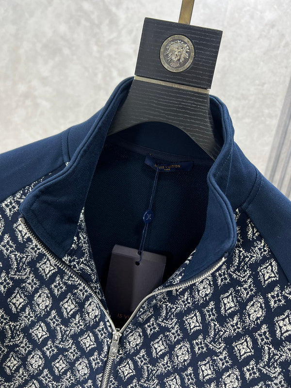 Close-up detail shot of Louis Vuitton luxury clothing with runway-inspired design