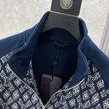 Close-up detail shot of Louis Vuitton luxury clothing with runway-inspired design