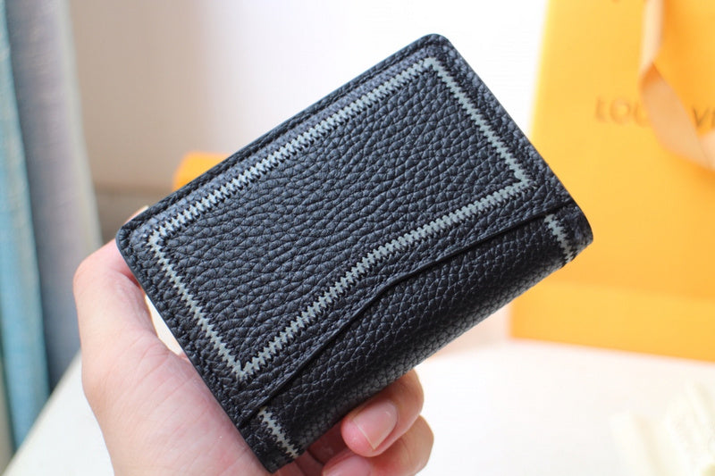 Styled lifestyle shot of classic signature women's handbag – women's premium purse