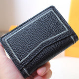 Styled lifestyle shot of classic signature women's handbag – women's premium purse
