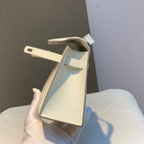 Side view of graceful structured handbag