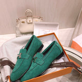 Hermès Grey Bow-Detail Flats - Angled View