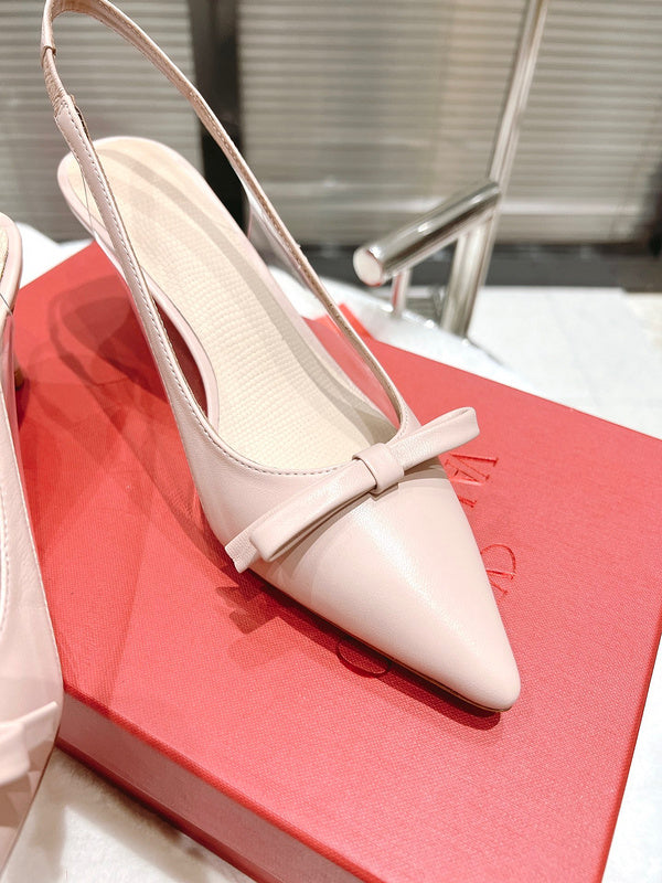 Three-quarter angle view of Valentino Garavani luxury piece style No.199
