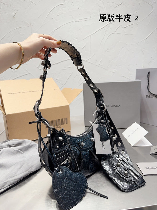 Ziva's Charm handbag – side angle view (one versatile size)