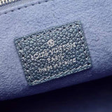 Side profile of refined structured women's handbag – women's statement bag