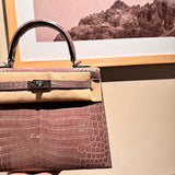 Side view of poised structured handbag