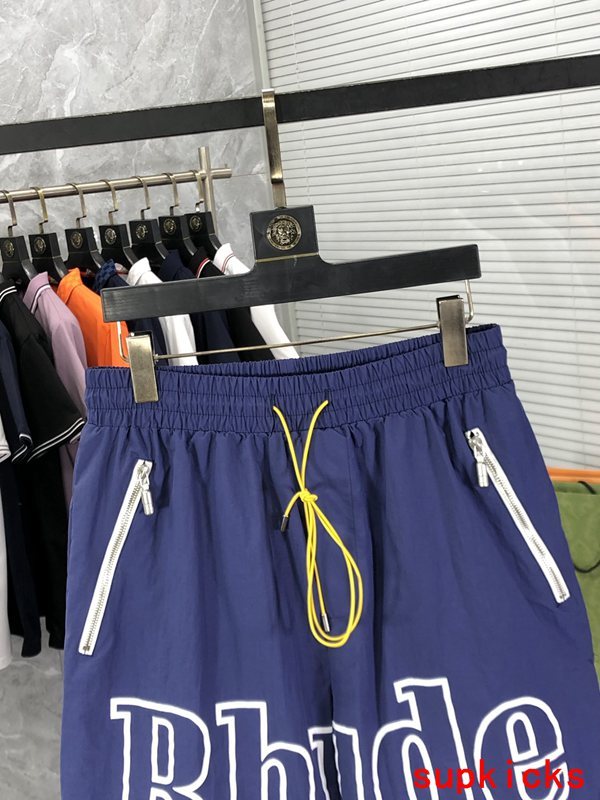 Close-up detail shot of Rhude luxury clothing with logo-detail design