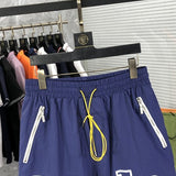 Close-up detail shot of Rhude luxury clothing with logo-detail design