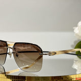 Close-up detail view of Cartier unisex sunglasses