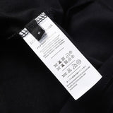 Side profile of Polo cotton polo shirt with monogram-inspired silhouette