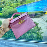 Side view of refined structured handbag