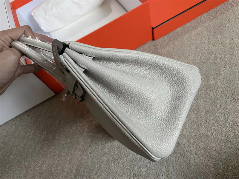 Side view of modernist structured handbag