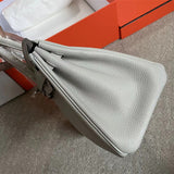 Side view of modernist structured handbag